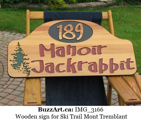 Wooden sign for Ski Trail Mont Tremblant